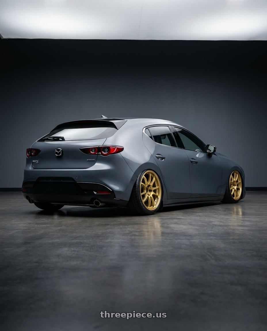 2023 Mazda Mazda3 Turbo with Advan RCIII 5x114.3 18x7.5+45 Gold wheels rear three quarter view slight stretch tires