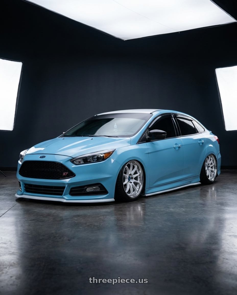 Blue 2016 ford focus sedan with st front end  with Advan Racing ONI2 PROGRESSIVE 5x114.3 20x9.5 +37 MACHINING & DIAMOND CUT wheels