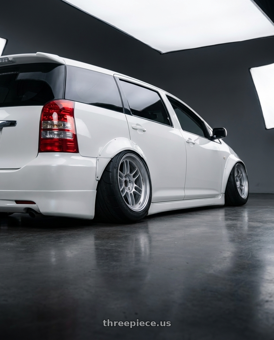 2005 toyota wish with Enkei RPF1 4x100 15x7+41 Silver wheels rear three quarter view excessive tires