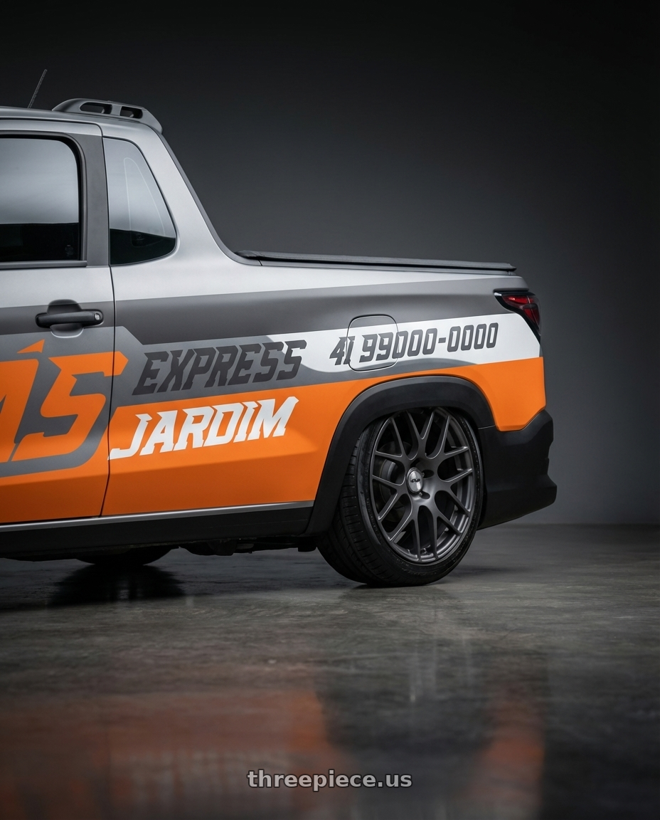 fiat strada endurance adesivada 2025 with TSW NURBURGRING 5X114.3 17X7.5 +45 MATTE GUNMETAL wheels rear three quarter view square tires