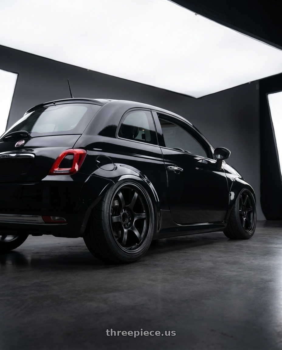 2017 Fiat 500 Lounge Black with Gram Lights 57DR 4x100 15x8.0+28 Semi Gloss Black wheels rear three quarter view meaty tires