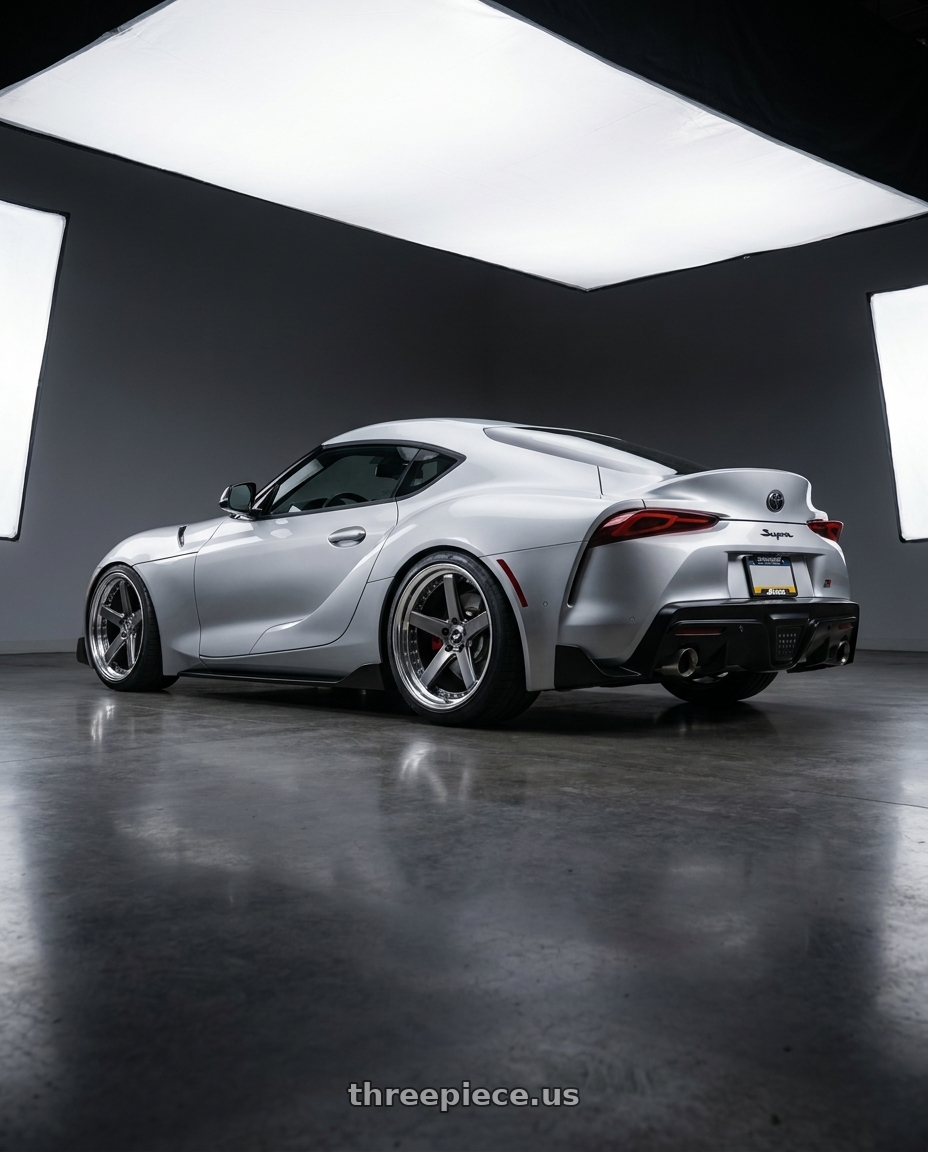 2020 gr supra premium with Work Zeast Black Label Bst2 5x112 20x11+38 S Disk Brilliant Silver Black wheels rear three quarter view square tires