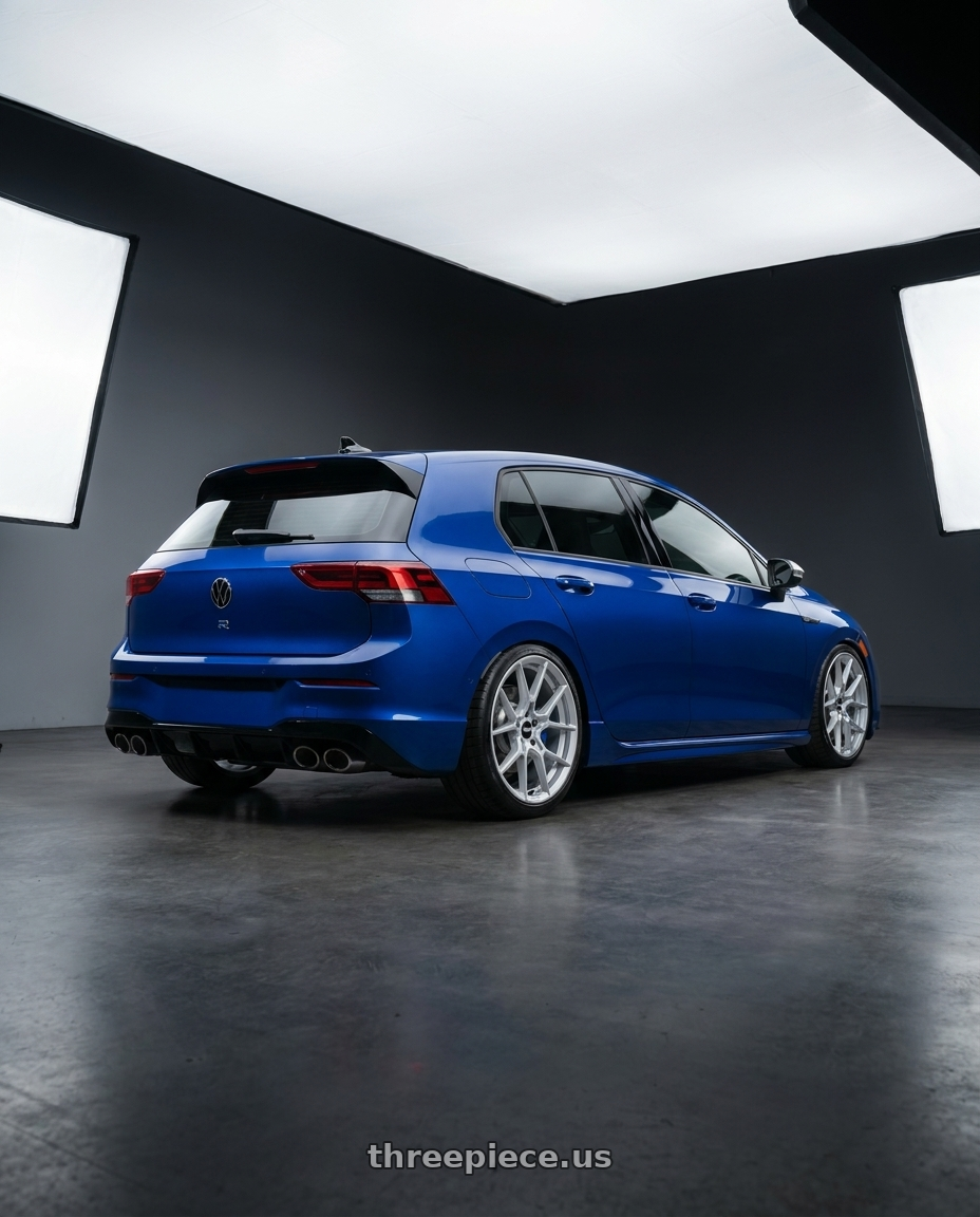 2026 Volkswagen Golf r blue with Rotiform RC199 KPR 5X112 19x8.5 +45 SILVER wheels rear three quarter view square tires