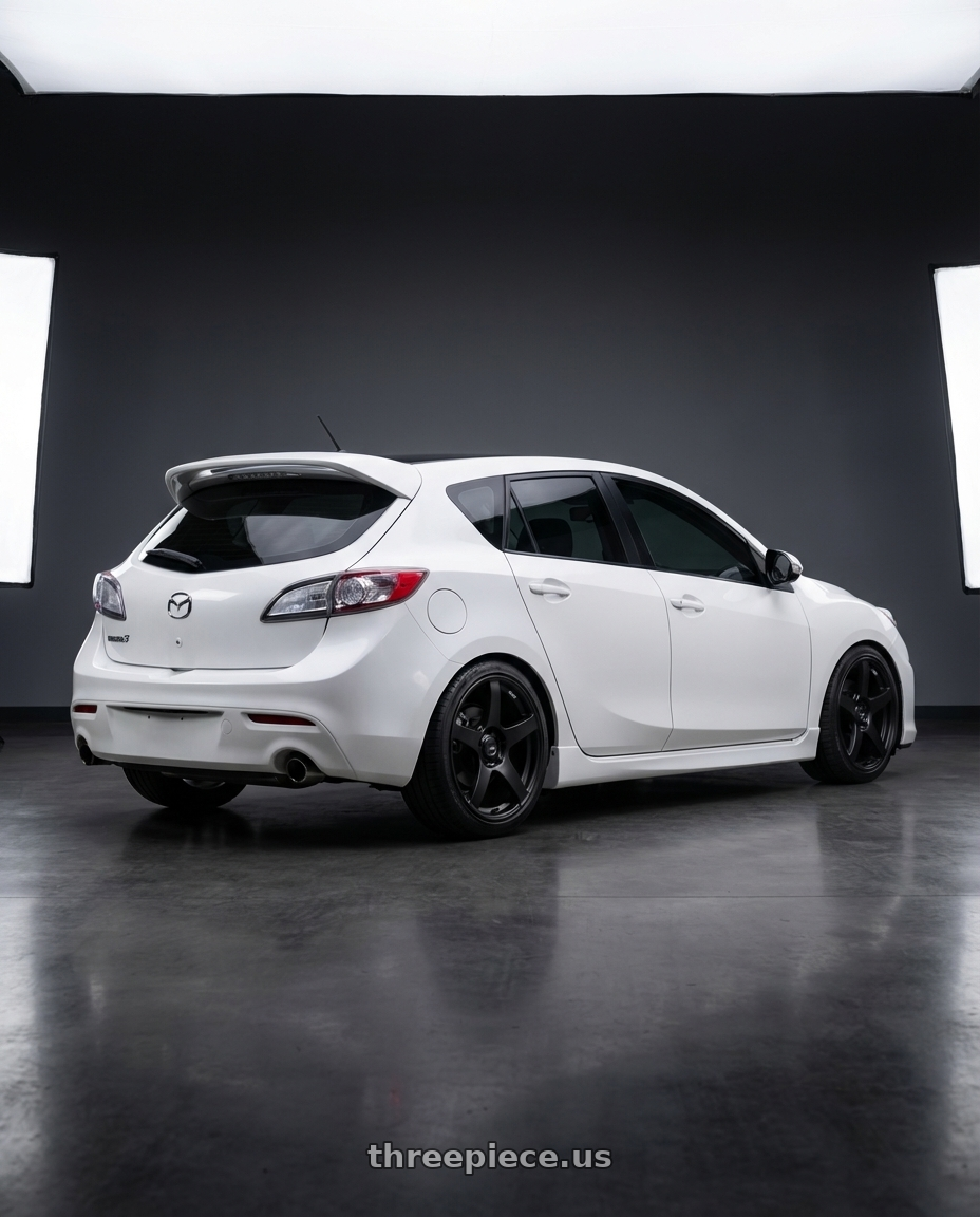 2012 Mazda Mazdaspeed3 with Ssr Gtv01 5x114.3 18x8.5+40  FLAT BLACK wheels rear three quarter view square tires