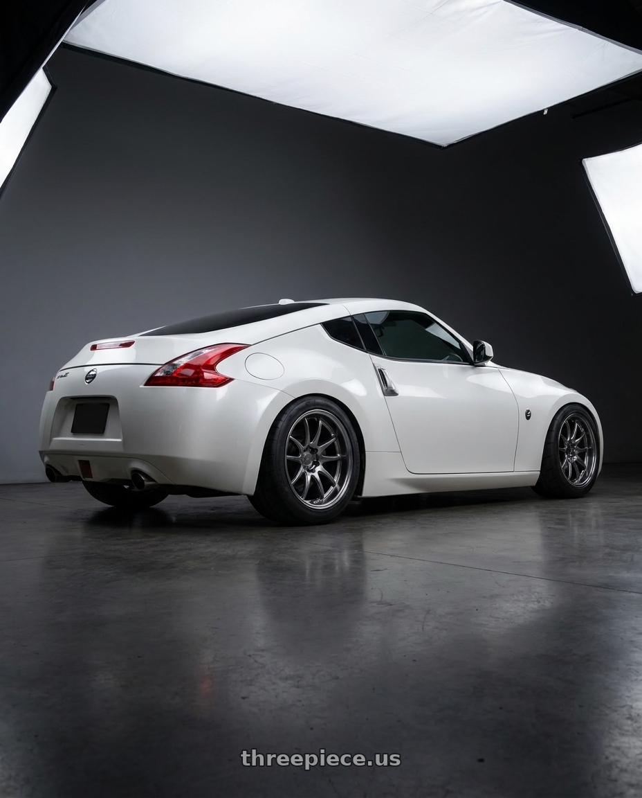 2014 370z nissan with Aodhan DS02 5x114.3 18x8.5+35 Hyper Black wheels rear three quarter view meaty tires