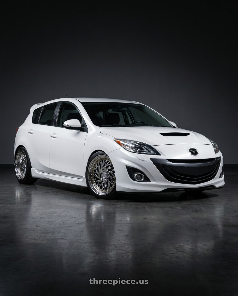 2012 Mazda Mazdaspeed3 with Aodhan DS03 5x114.3 18x9.5 +30 Vacuum Chrome w/Gold Rivets wheels