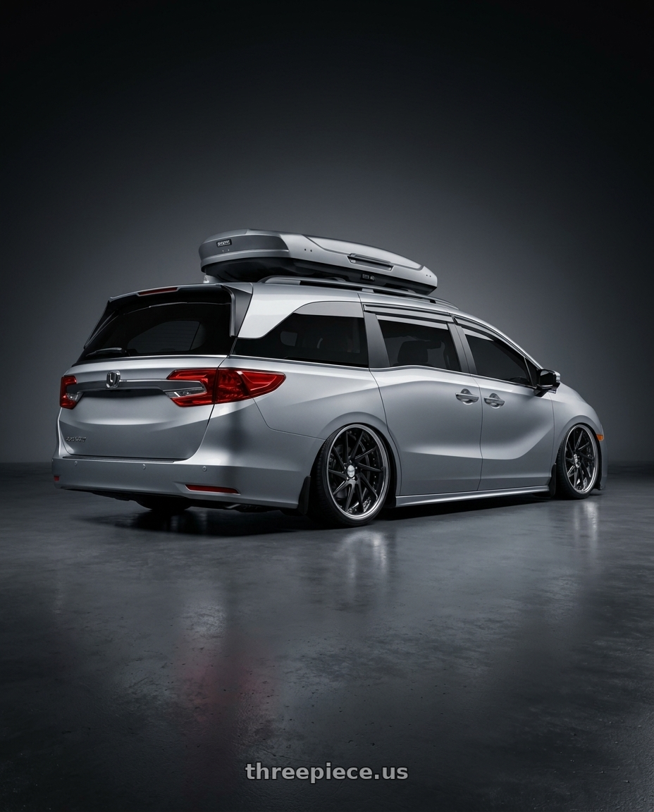 2024 Honda Odyssey with Work Gnosis Cvs 5x120 20x8.5+45 O Disk Matte Black wheels rear three quarter view slight stretch tires