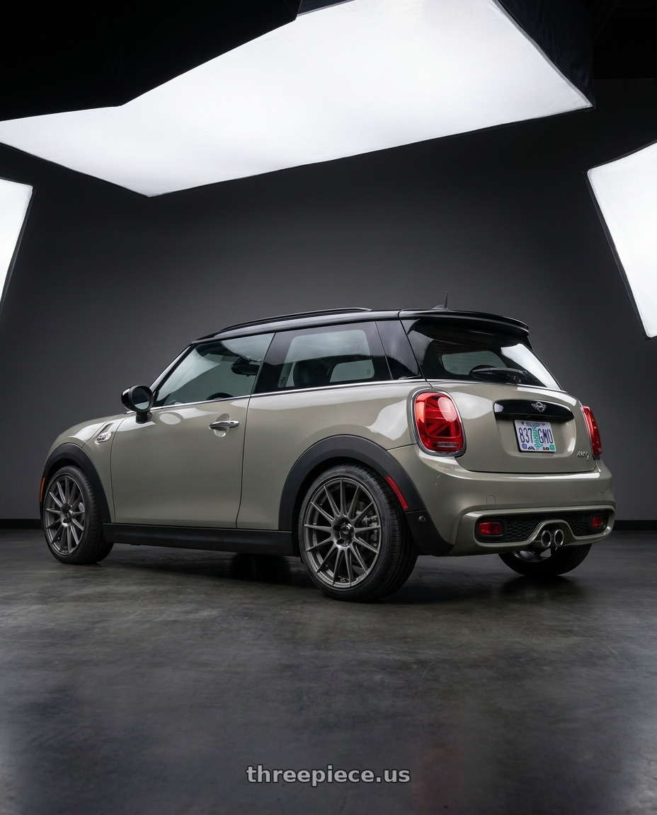 2019 mini cooper S with Konig Rennform 5x112 18x8+45 Matte Grey wheels rear three quarter view square tires