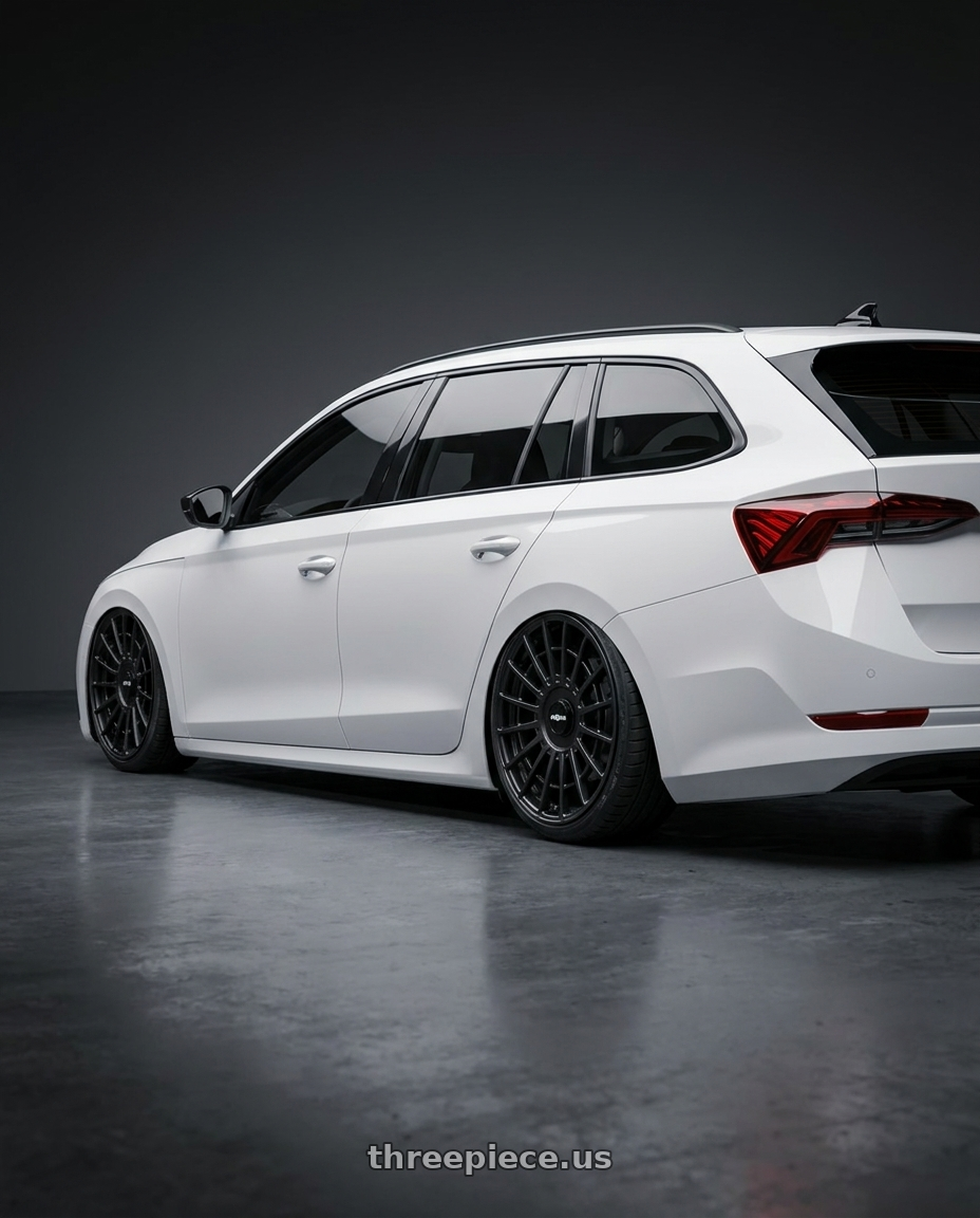 2025 SKODA OCTAVIA with Rotiform 1PC R142 LAS-R 5X112/5X114.3 19X8.5 +35 MATTE BLACK wheels rear three quarter view slight stretch tires