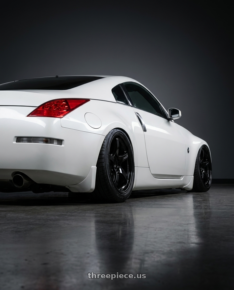2005 Nissan 350z with Gram Lights 57CR 4x100 15x8+28 Glossy Black wheels rear three quarter view square tires
