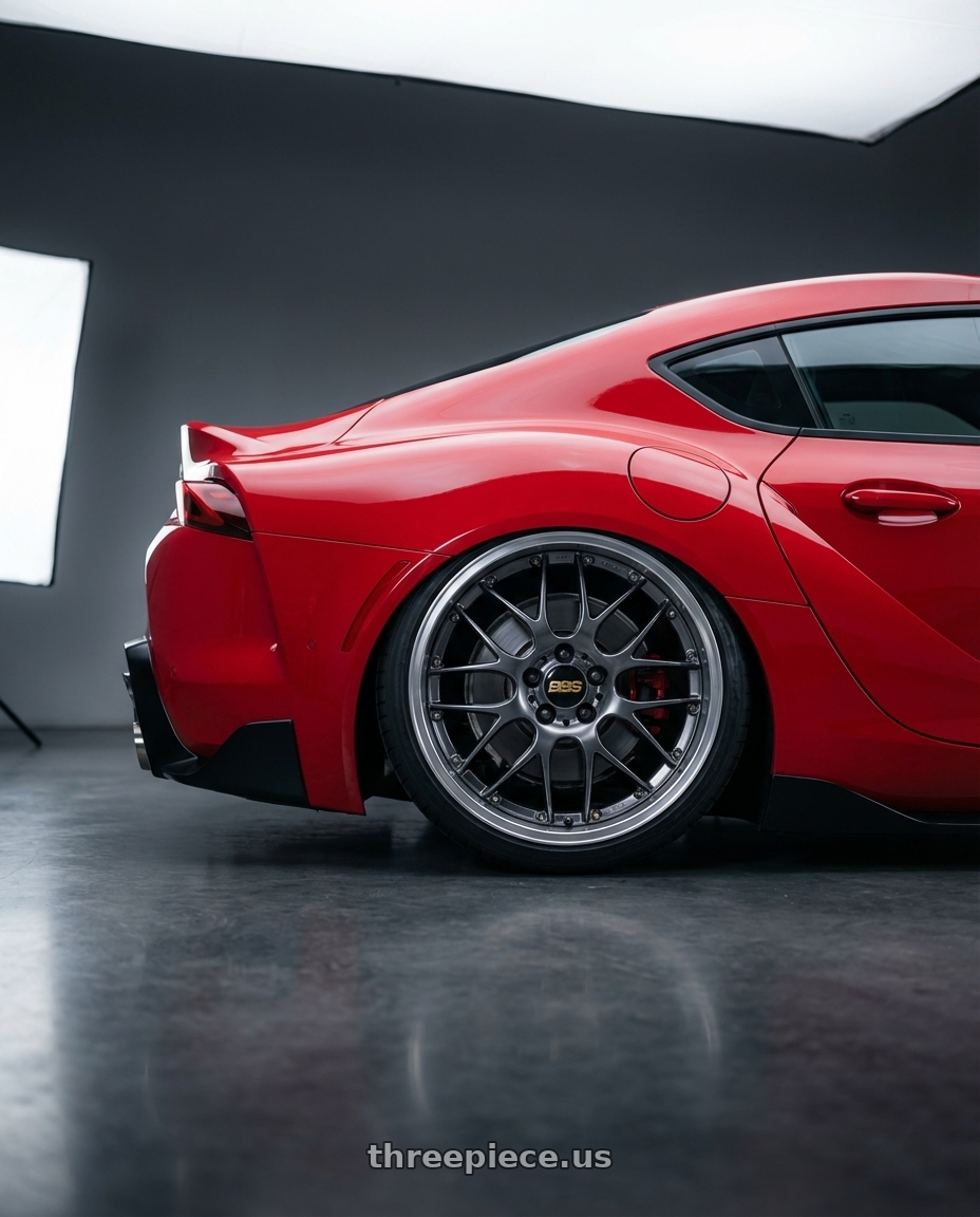 2023 Toyota GR Supra with BBS RS-GT 5x112 19x8.5 +32 Diamond Black Center Diamond Cut Lip wheels rear three quarter view slight stretch tires