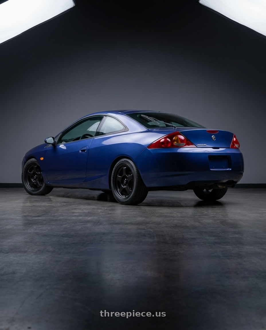 2002 Mercury Cougar with Vors SP1 4x108 15x7  +35 All Matte Black wheels rear three quarter view square tires