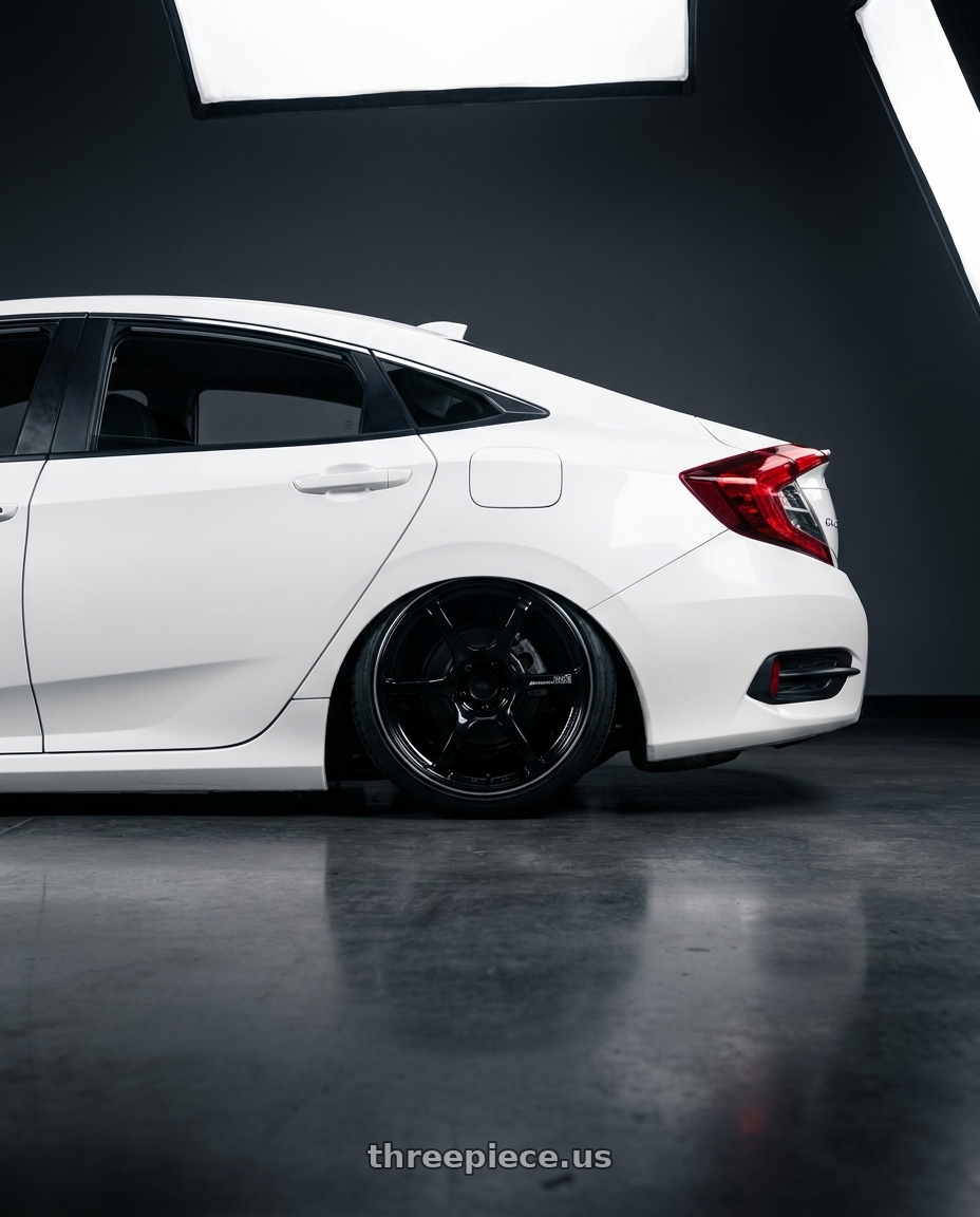 2019 Honda Civic with Advan RGII 5x114.3 19x10+35 Gloss Black wheels rear three quarter view slight stretch tires