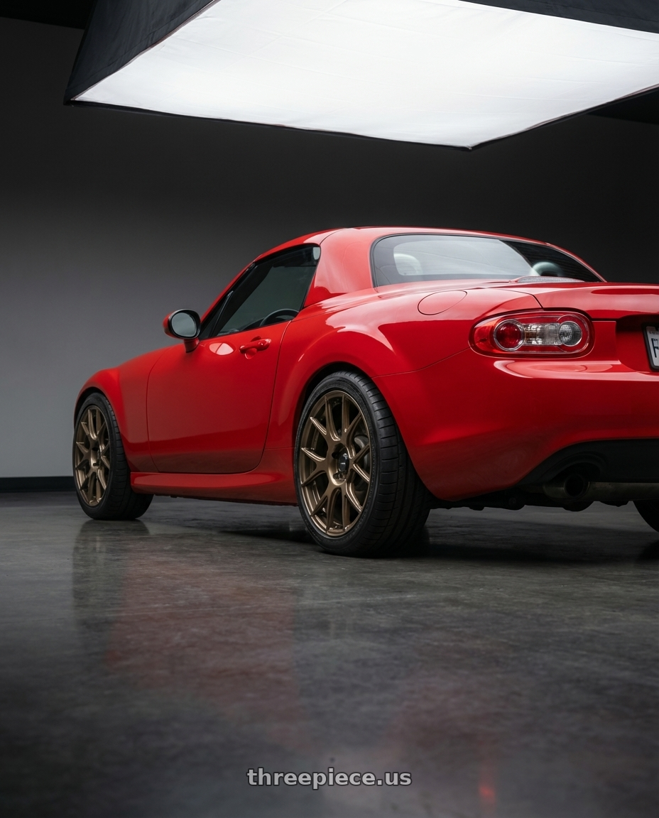 2012 Mazda MX-5 Miata NC with Konig Ampliform 5x114.3 17x9+40 Gloss Bronze wheels rear three quarter view square tires