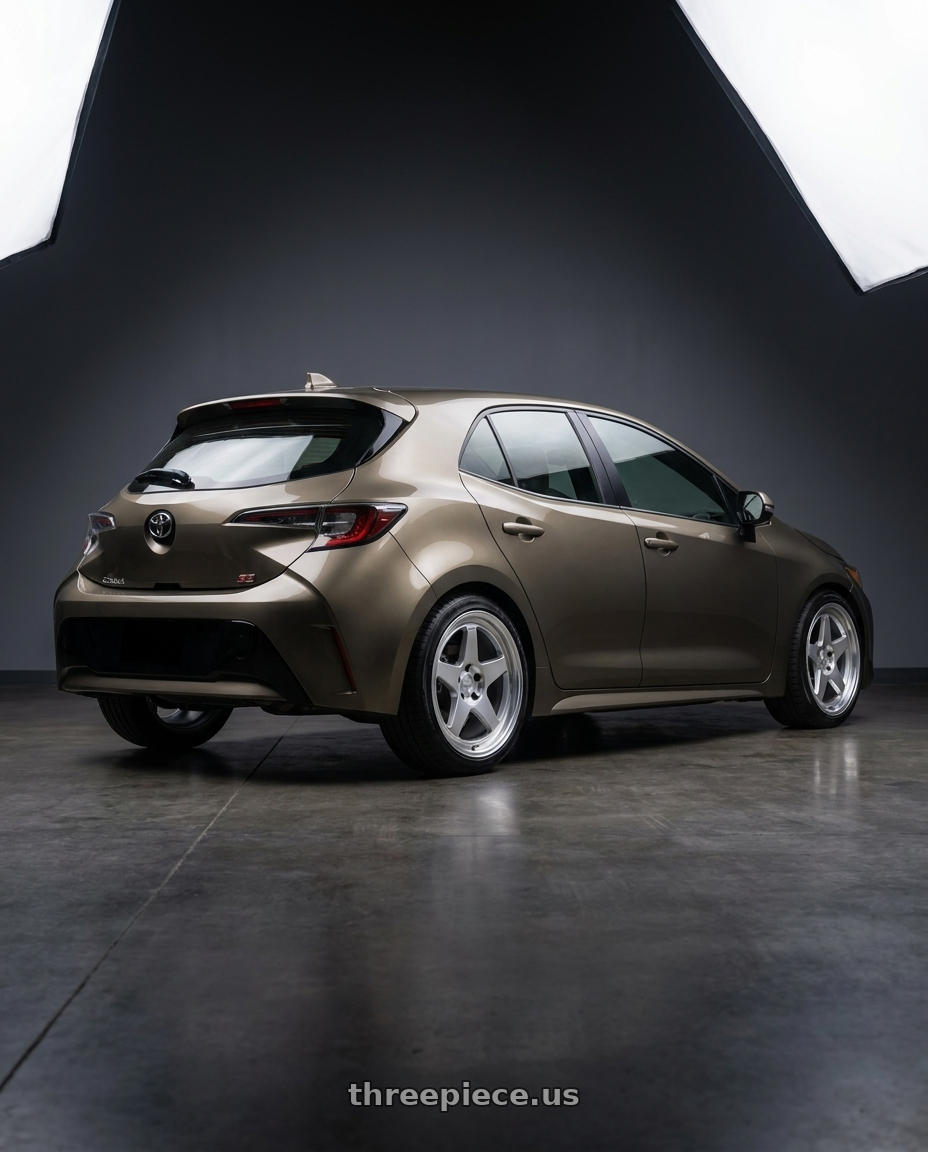 2019 Corolla Hatch se oxidize bronze with Kansei K12H KNP 5X100 18x9 35 Hyper Silver wheels rear three quarter view square tires