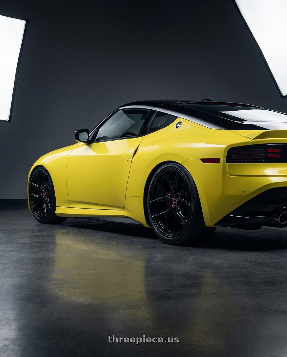 2024 Nissan Z with Vossen HF-5 19x8.5 / 5x114.3 / ET32 / Flat Face / 73.1 - Gloss Black Wheel - HF5-9N60 wheels rear three quarter view slight stretch tires