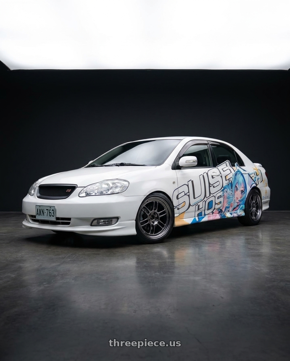 2003 Toyota Corolla with Enkei RPF1 5x100 16x7+35 SBC wheels front three quarter view lowered stance