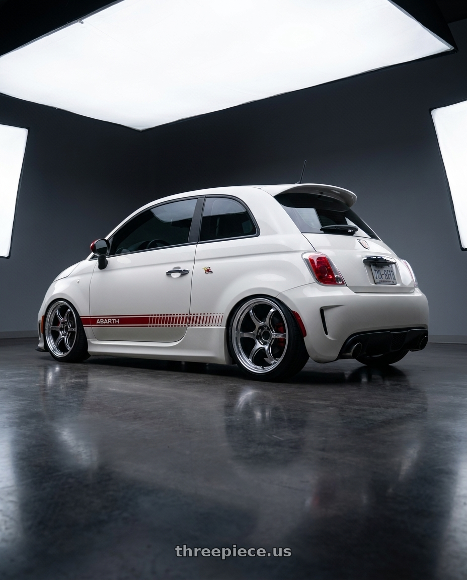 2012 Fiat abarth white with Advan Racing RG-D2 4x98 17x7.5 +30 MACHINING & RACING HYPER BLACK wheels rear three quarter view slight stretch tires