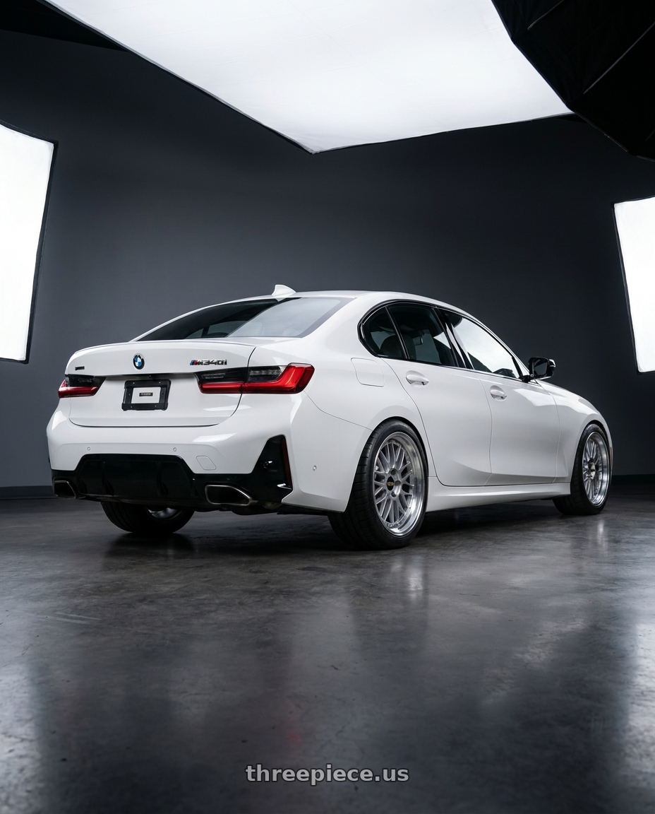 2023 BMW M340i with BBS LM 5x112 19x8.5+32 Diamond Silver wheels rear three quarter view meaty tires