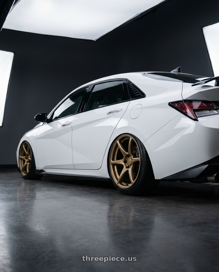 2024 Hyundai Elantra N with Kansei K11B Tandem 5x114.3 19x9.5 12 Bronze wheels rear three quarter view slight stretch tires