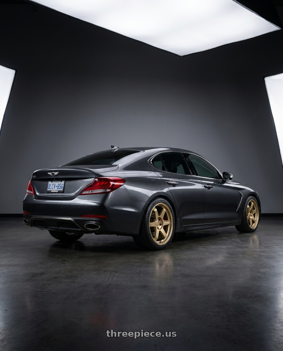 2019 Genesis G70 with Volk Racing TE37 ULTRA M-SPEC 5x120 19x8.5 +36 GOLD wheels rear three quarter view slight stretch tires