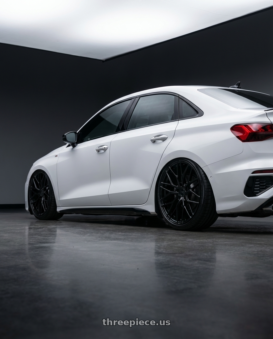 2024 Audi S3 8Y with Avant Garde Wheels M520R 5X112 19x8.5 +35 Gloss Black wheels rear three quarter view slight stretch tires