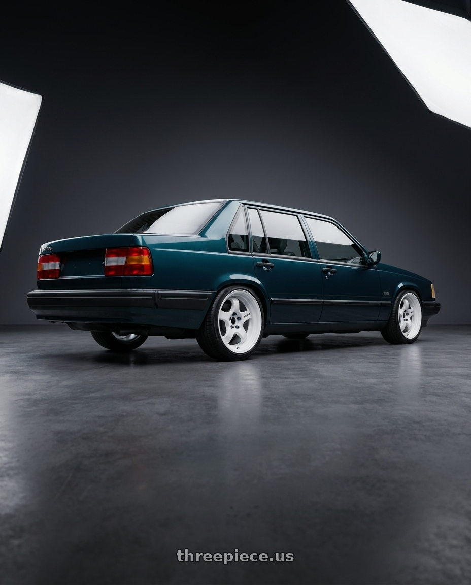 1991 Volvo 940 se with Work Meister S1 2P 5x108 15x7+12 A Disk Black wheels rear three quarter view square tires