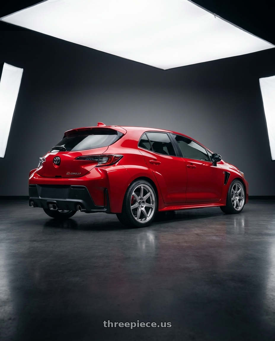 2026 Toyota GR Corola with Work T7r 2P 5x114.3 18x9.0 +22 GT SILVER wheels rear three quarter view square tires