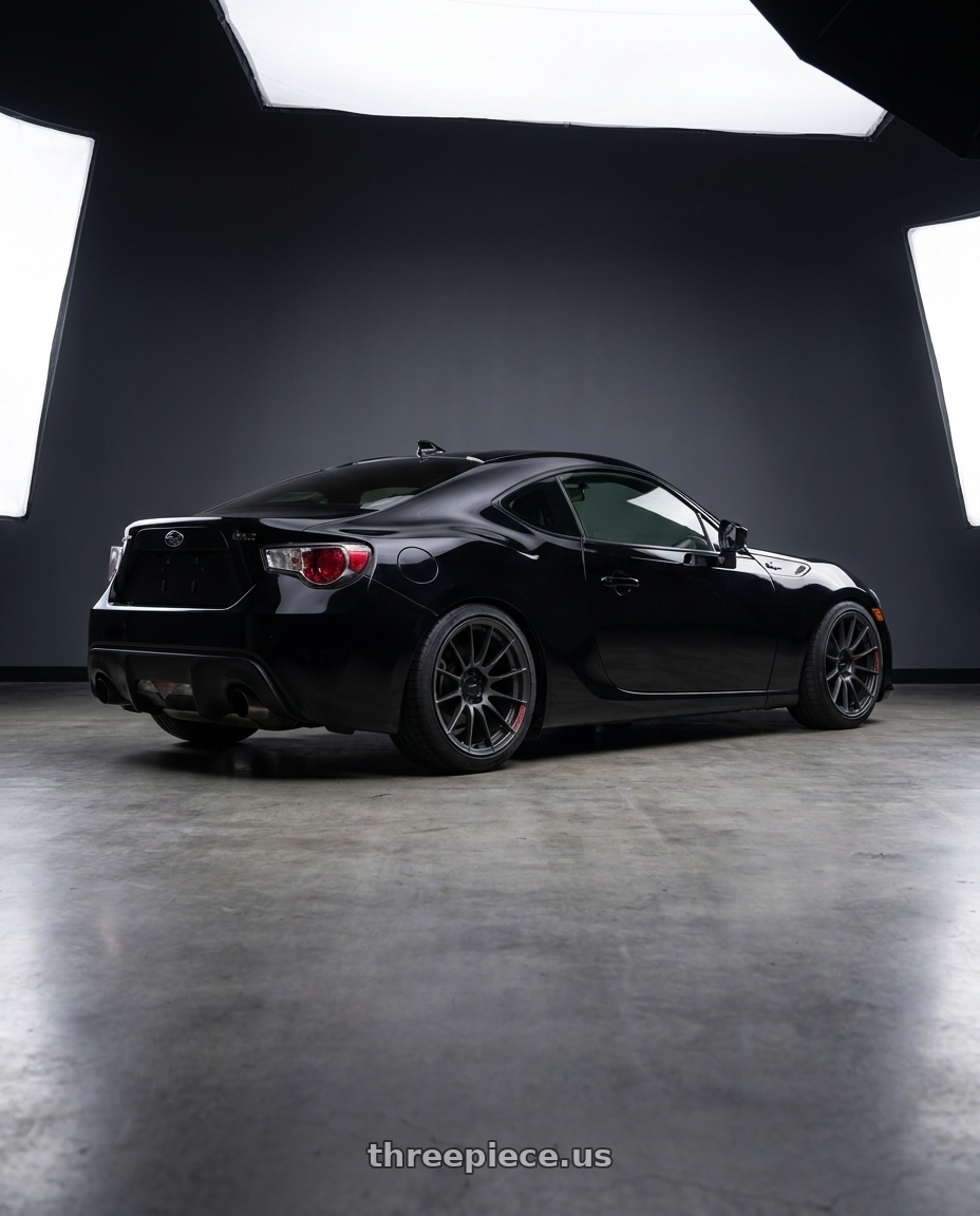 2013 Subaru brz with Enkei RS05-RR 5x100 18x9.5+43 Matte Gunmetal wheels rear three quarter view slight stretch tires