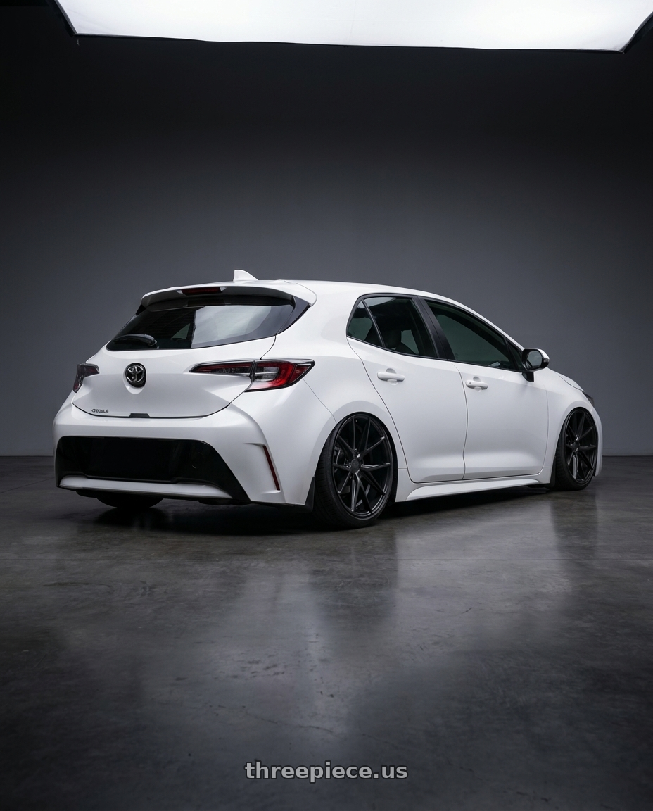 2023 Toyota Corolla Hatchback with Niche 1PC M117 MISANO 5X114.3 18X8 +40 MATTE BLACK wheels rear three quarter view slight stretch tires
