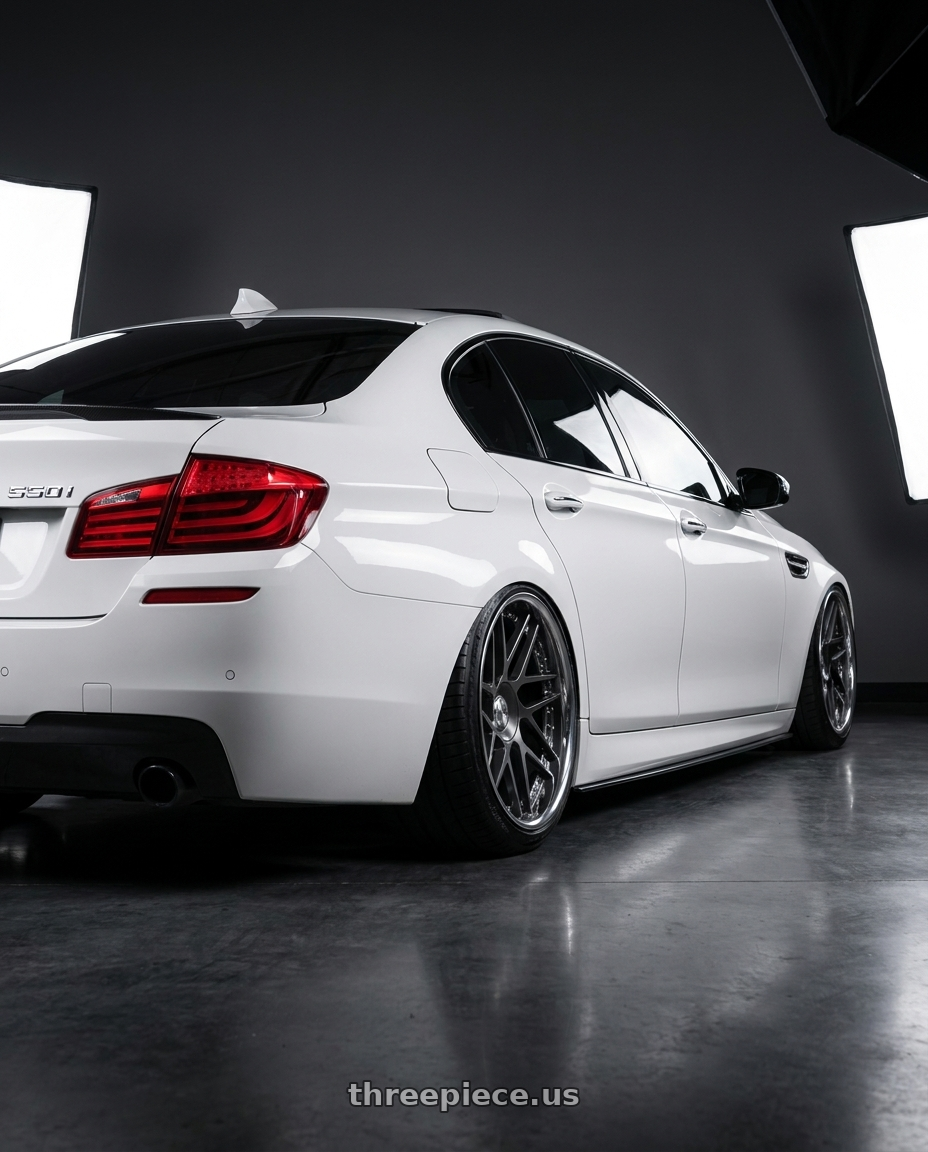 2012 BMW 550i with Leon Hardiritt Geist 21x10.0+42 Super Low Disk wheels rear three quarter view extreme stretch tires