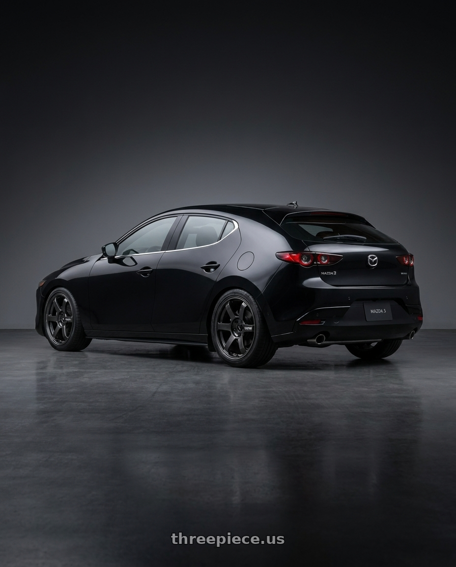 2023 mazda 3 with Volk Racing TE37 Saga S-Plus 5x114.3 18x8.0+45 Diamond Dark Gunmetal wheels rear three quarter view square tires