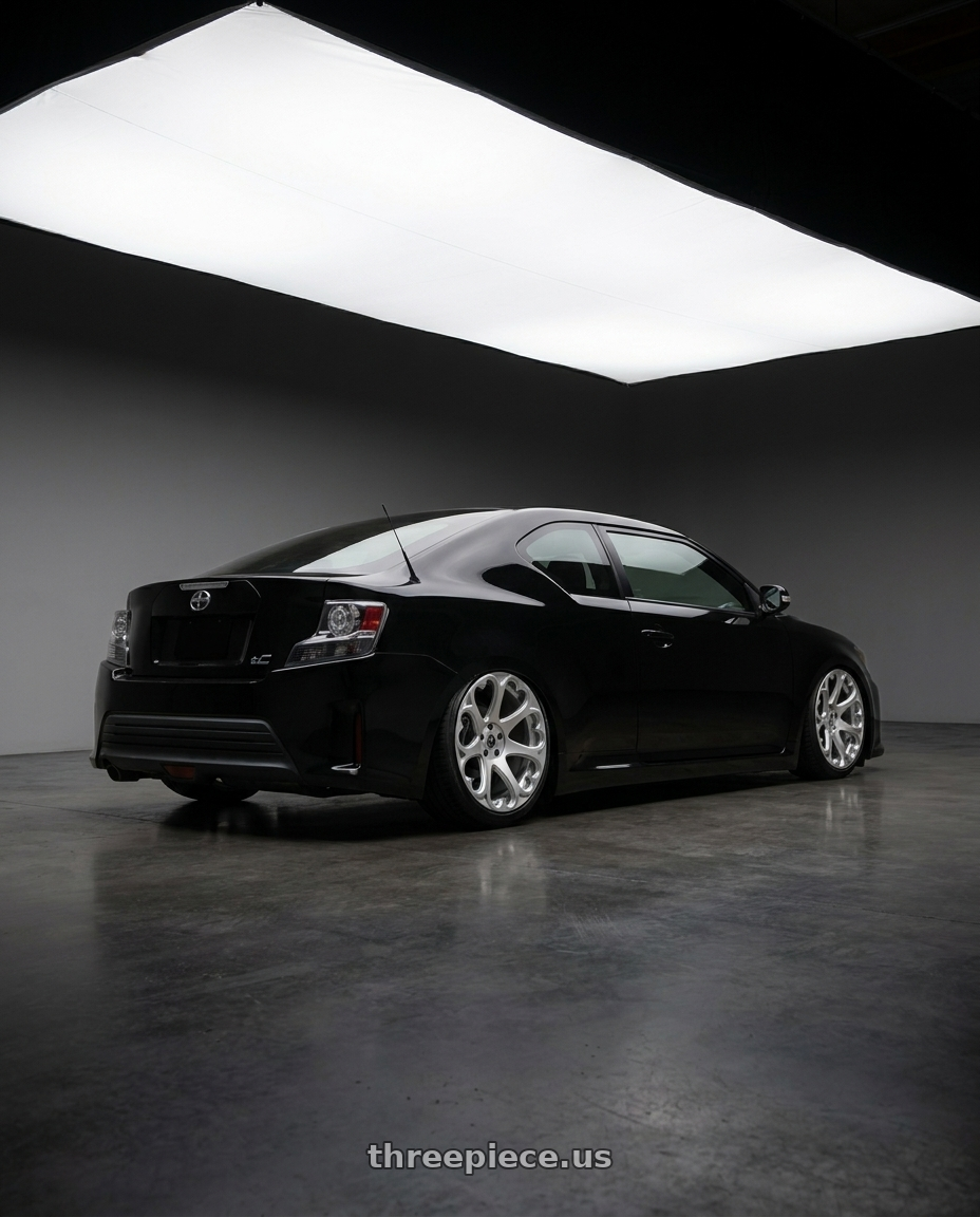 2014 Scion tc negro with Heritage Wheel Kokoro Monoc 5X100 18x9.5+38 Silver wheels rear three quarter view slight stretch tires