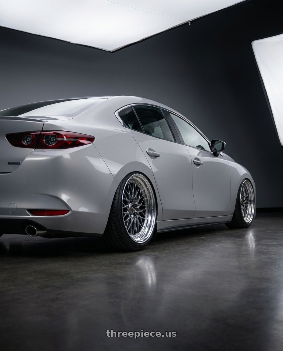 2022 mazda 3 with Work Vs-Xv 5x100 18x7+28 A Disk Brilliant Silver Black wheels rear three quarter view slight stretch tires