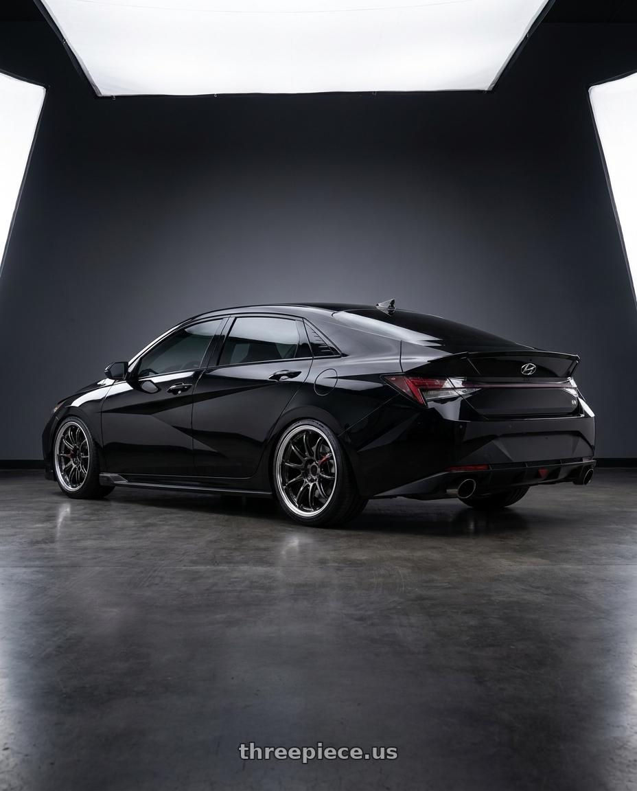 2023 Hyundai Elantra N Phantom Black with Work Zr10 2P 5x114.3 19x8.0 +45 Glim Black wheels rear three quarter view slight stretch tires
