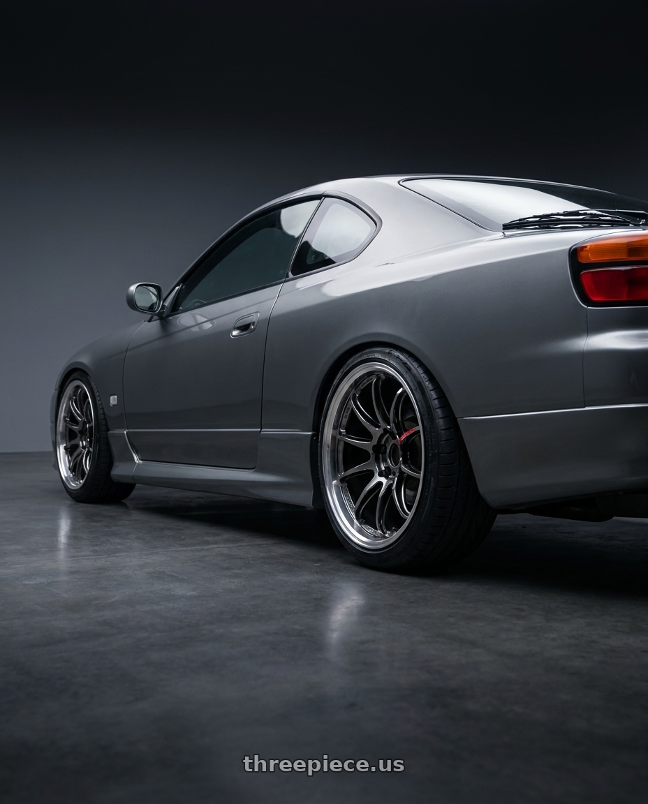 2002 Nissan S15 with Work Emotion Zr10 5x100 18x9.5 +30 Glim Black Diamond Rim cut wheels rear three quarter view slight stretch tires