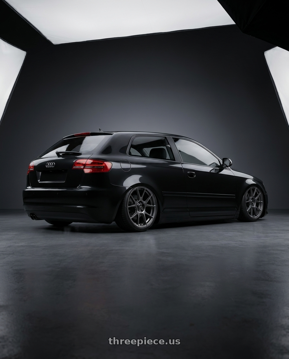 2012 Audi A3 8P with Konig Ampliform 5x112 19x8.5+32 Dark Metallic Graphite wheels rear three quarter view slight stretch tires