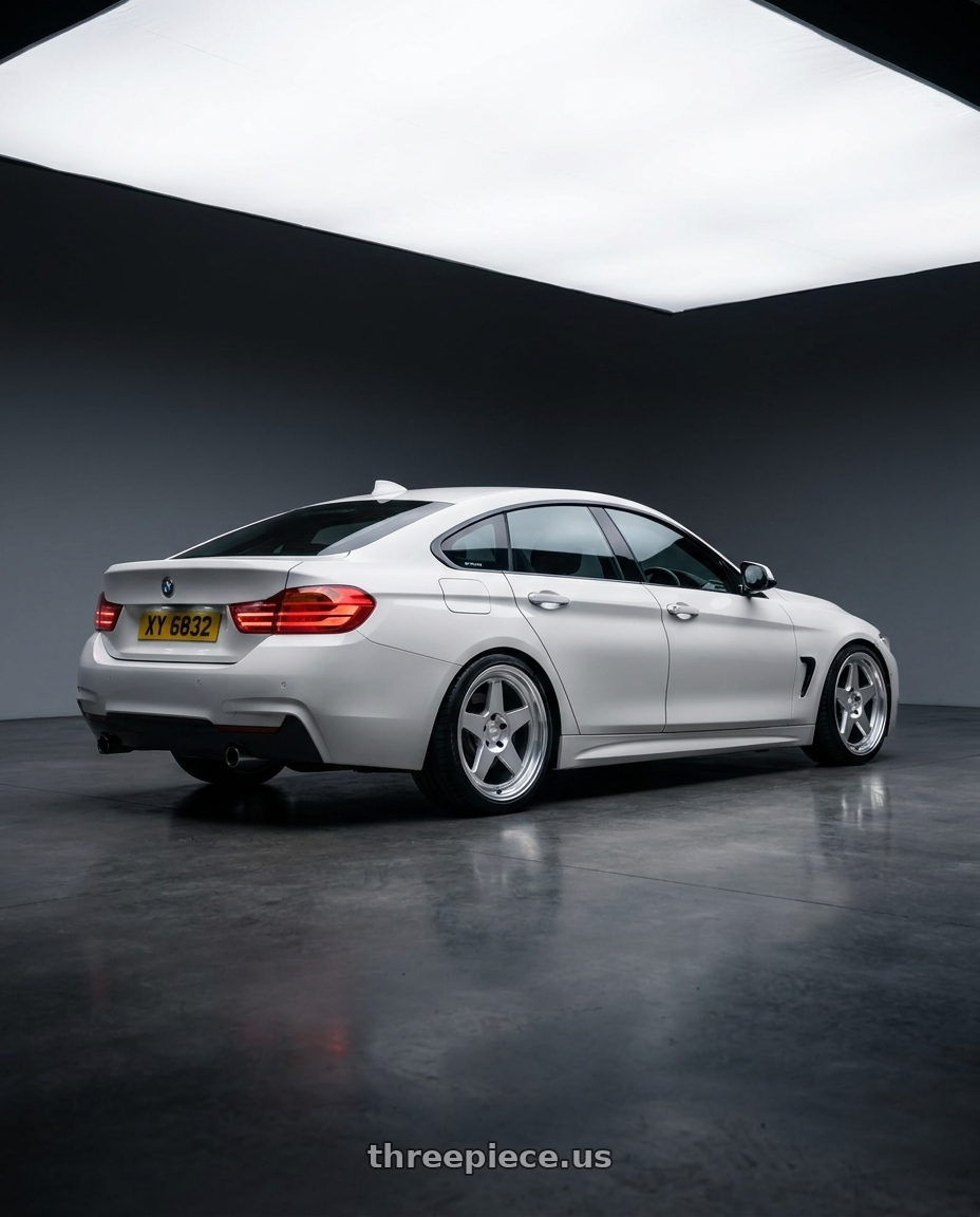 2015 BMW F36 with Kansei K12H KNP 5X120 19x10.5 35 Hyper Silver wheels rear three quarter view square tires