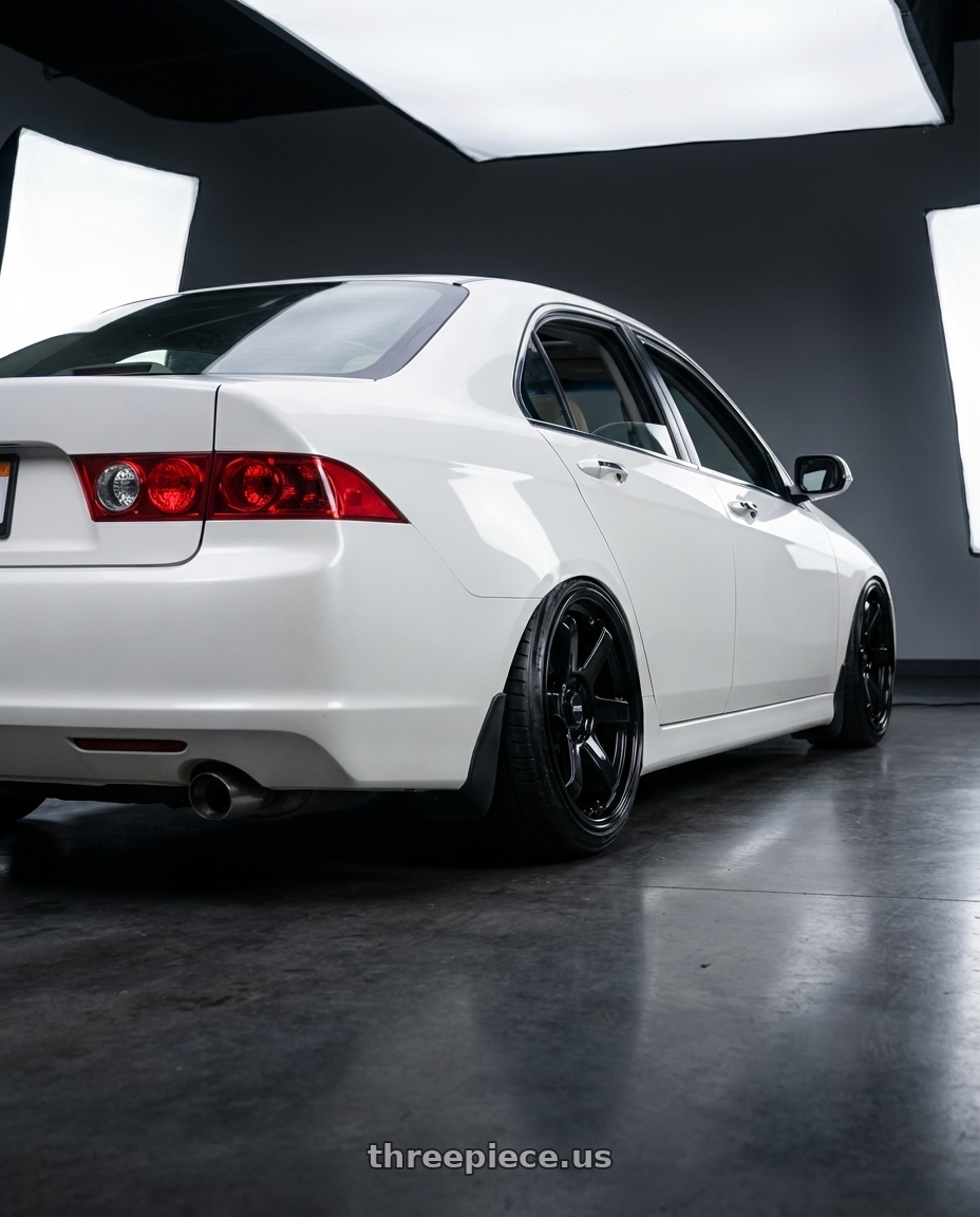 2005 Acura Tsx  with F1R F106 5x114.3 18x8.5 +35 Gloss Black wheels rear three quarter view slight stretch tires