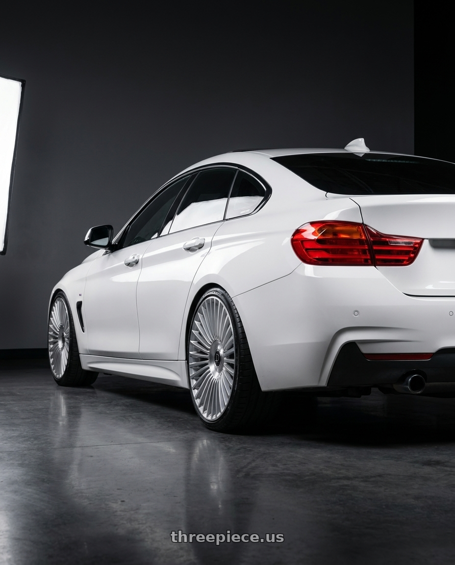 2015 BMW f36 with DOLCE LUXURY TRENTO 6x135/6x139.7 22x9.5 +18 Glossy Silver Brush Face wheels rear three quarter view slight stretch tires