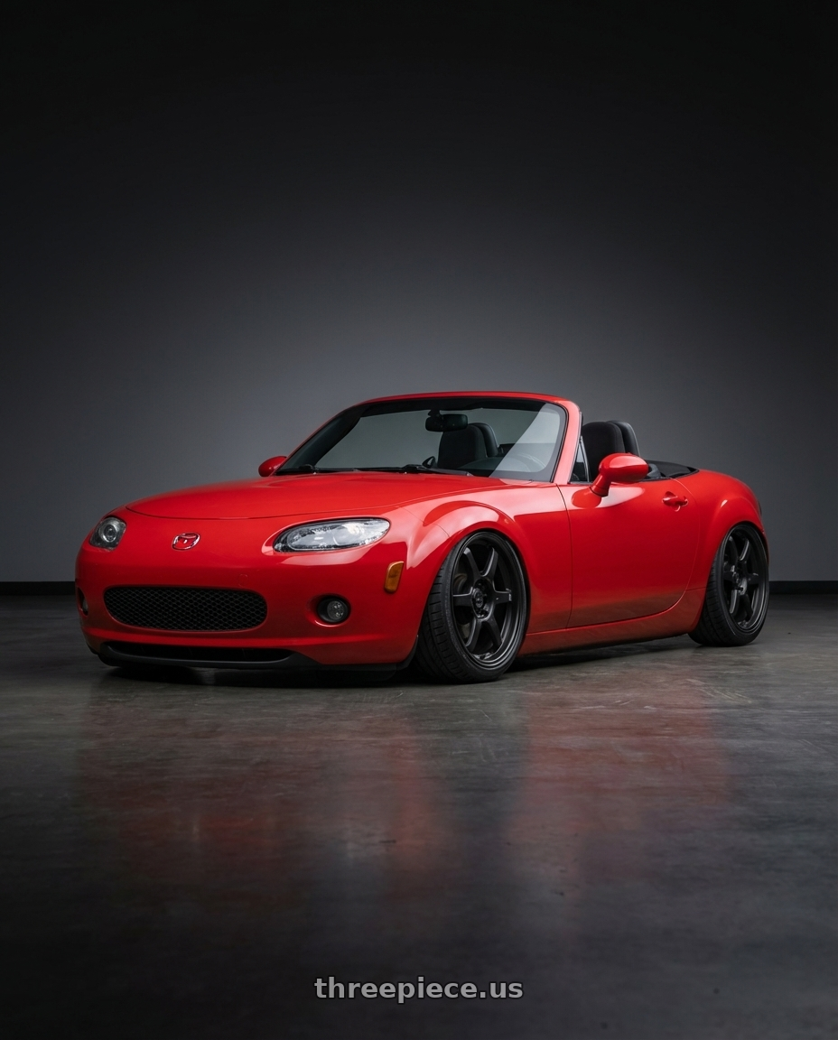 2012 Mazda MX-5 Miata NC with Konig Backbone 5x114.3 17x7.5+35 Matte Black Milling Logo on Spoke wheels front three quarter view stanced stance