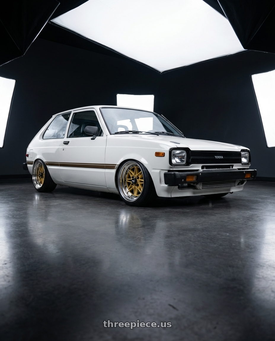 1981 toyota starlet with EQUIP 03 GOLD 15x8.5 -9 wheels