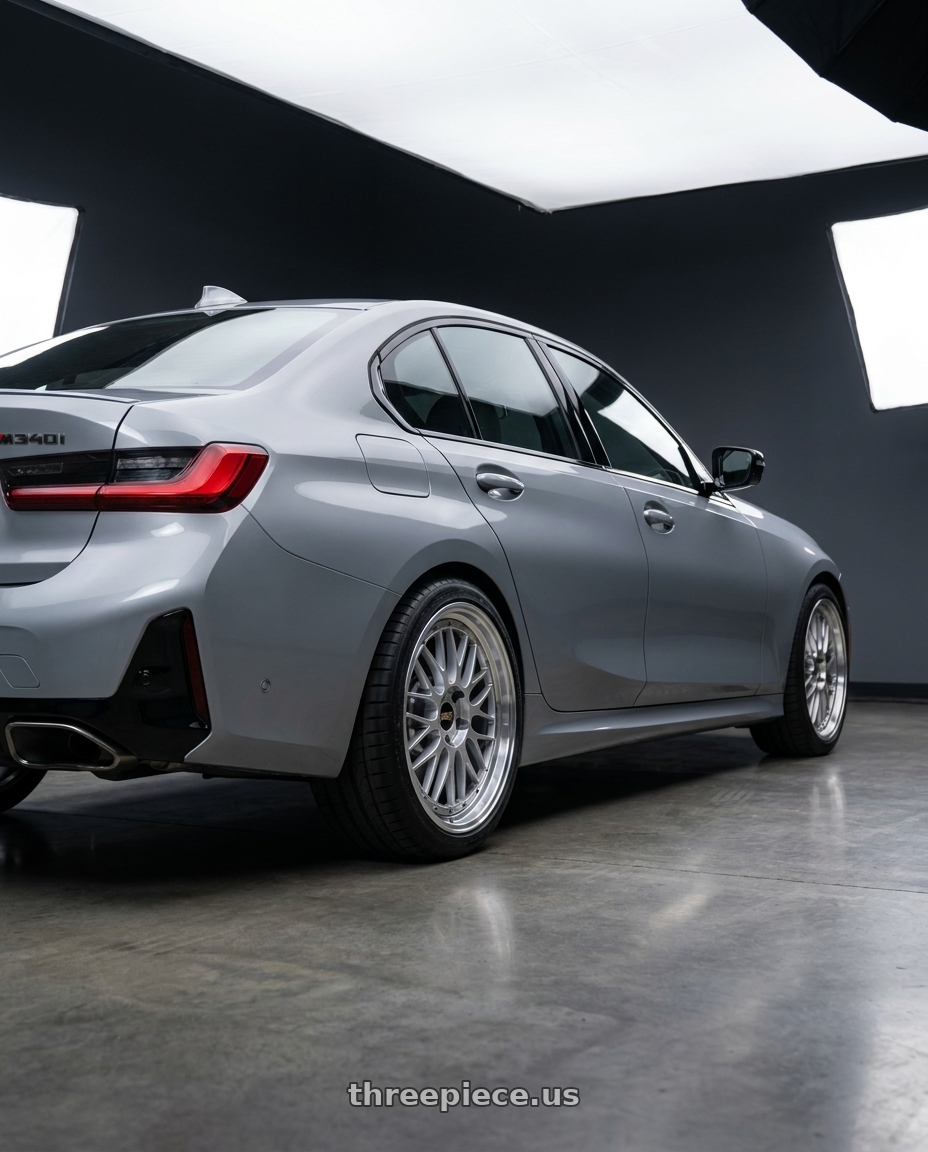 2024 BMW M340i with BBS LM 5x112 19x9.5+38 Diamond Silver wheels rear three quarter view square tires