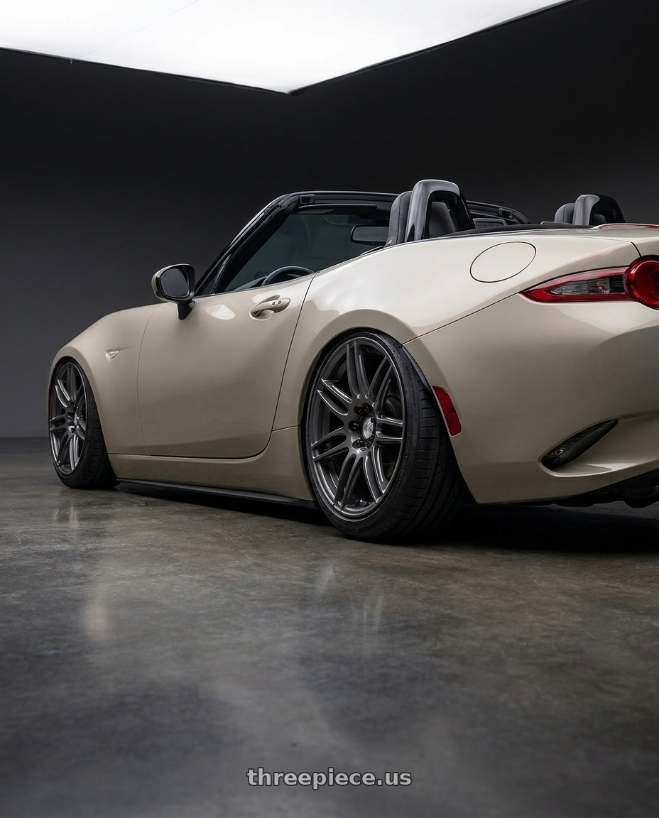 2021 Mazda MX-5 Miata ND with Niche 1PC M105 NR6 5X114.3/5X120 17X7.5 +45 MATTE GUN METAL wheels rear three quarter view slight stretch tires