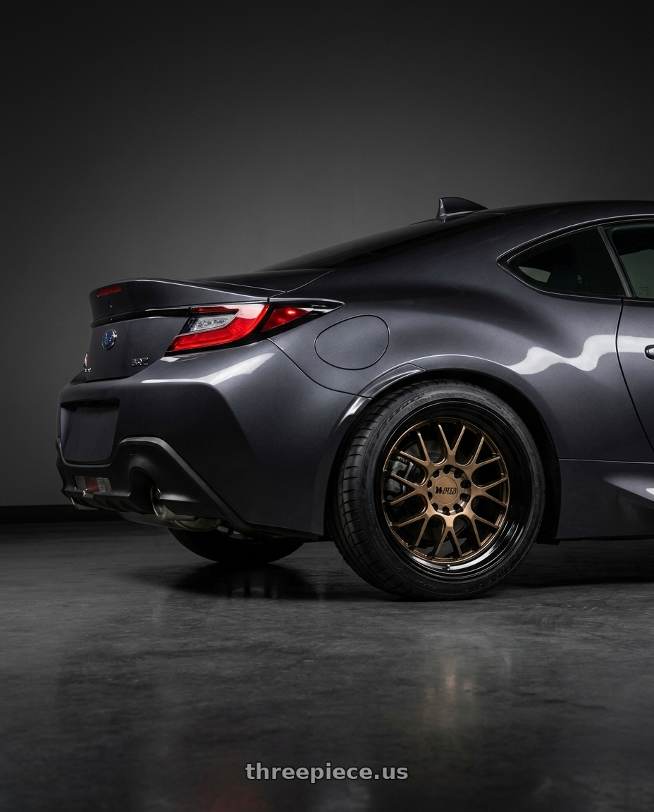 2023 Subaru BRZ premium with F1R F21 5x100/5x114.3 18x8.5 +38 Bronze/Black Lip v2 wheels rear three quarter view square tires