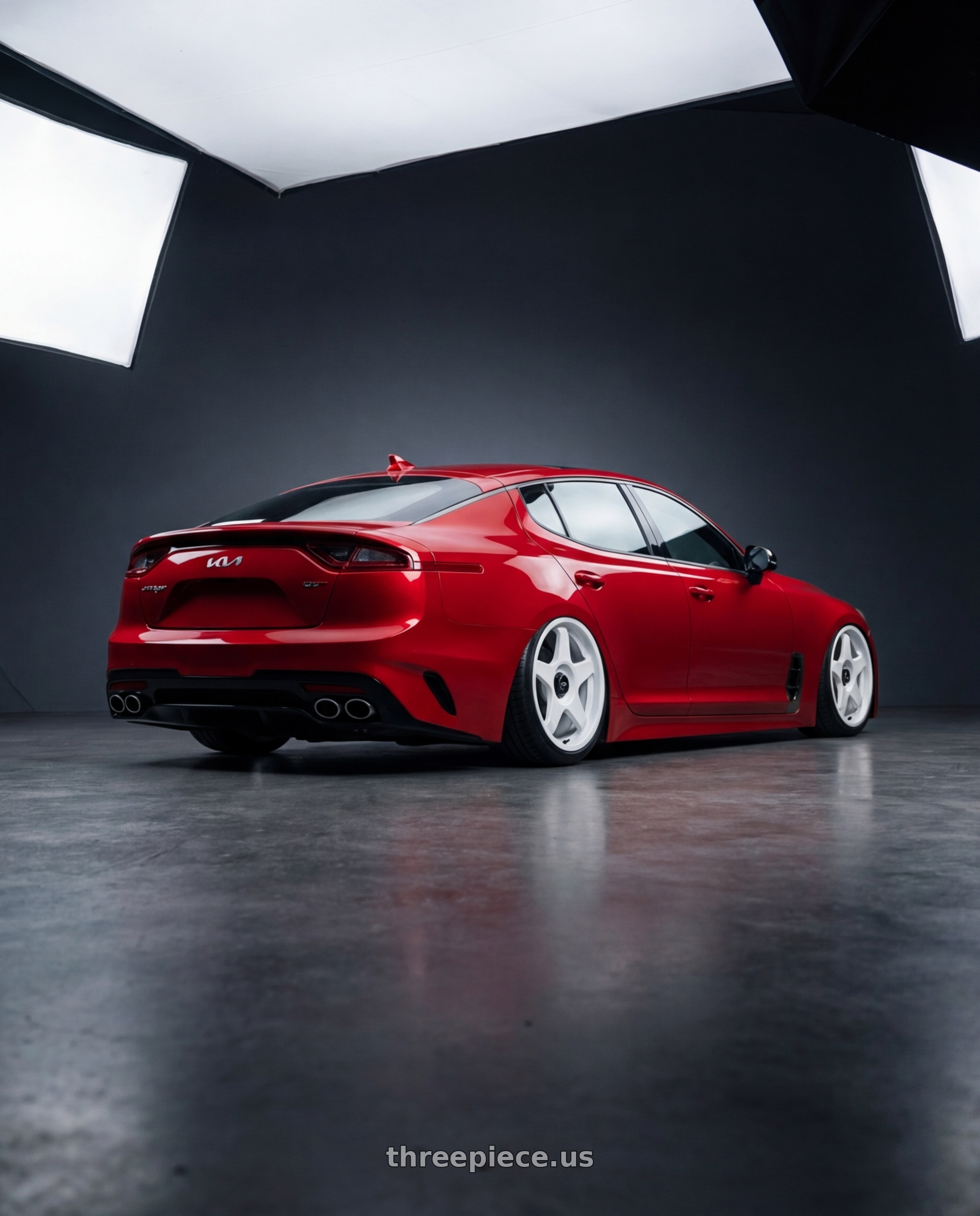 2022 Kia Stinger GT with fifteen52 CHICANE 5x114.3 / 5x120 19x8.5 +35 RALLY WHITE (GLOSS WHITE) wheels rear three quarter view slight stretch tires