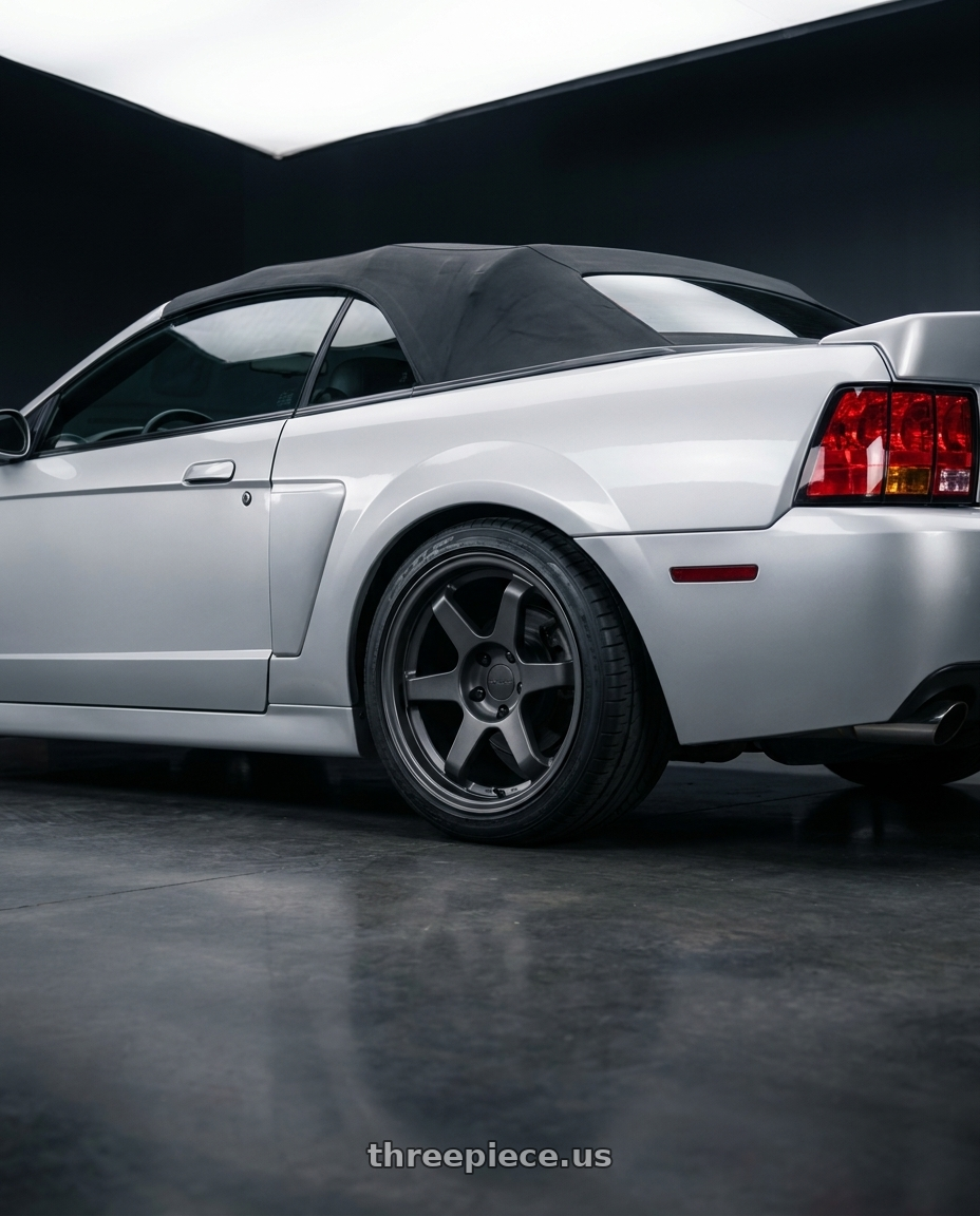 2004 ford mustang  with 9six9 SIX-1 5x114.3 18X8.5 +20 Carbon Gray wheels rear three quarter view square tires