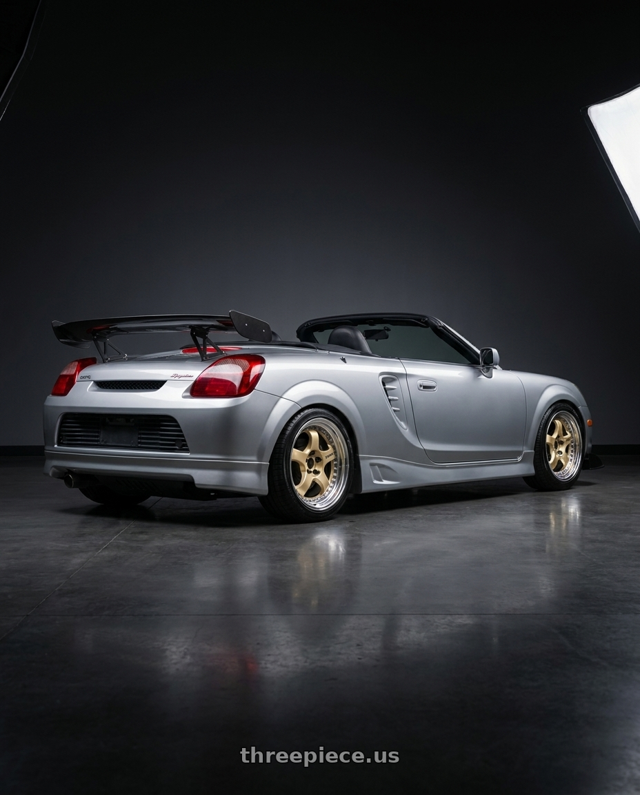 2001 Toyota MR2 Spyder Silver with Work Meister S1 3P 4x100 17x7+36 W Disk Bright Buff Finish wheels rear three quarter view square tires