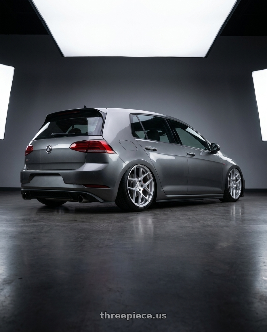 2019 Volkswagen GTI MK7 with Aodhan AFF2 5x112 19x9.5+35 Gloss Silver Machined Face wheels rear three quarter view slight stretch tires