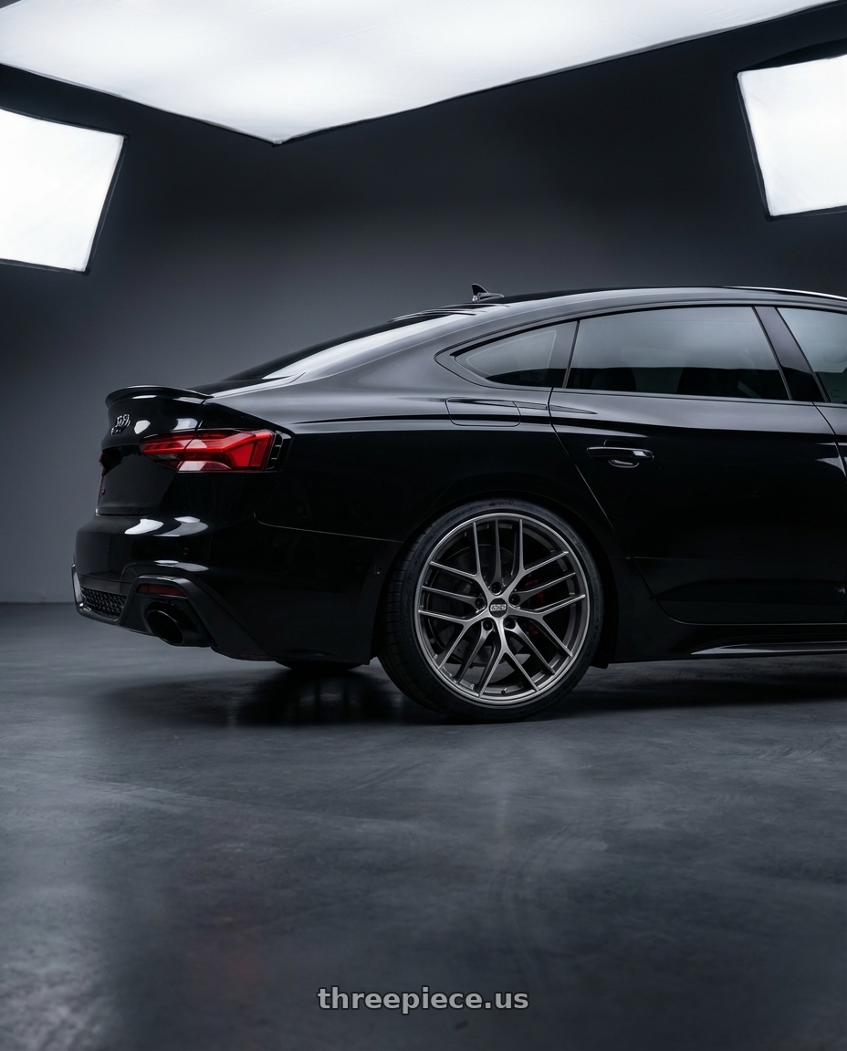 2022 Audi RS5 with BBS CC-R 5x112 20x9.0+25 Graphite w/ Diamond Cut Face wheels rear three quarter view square tires